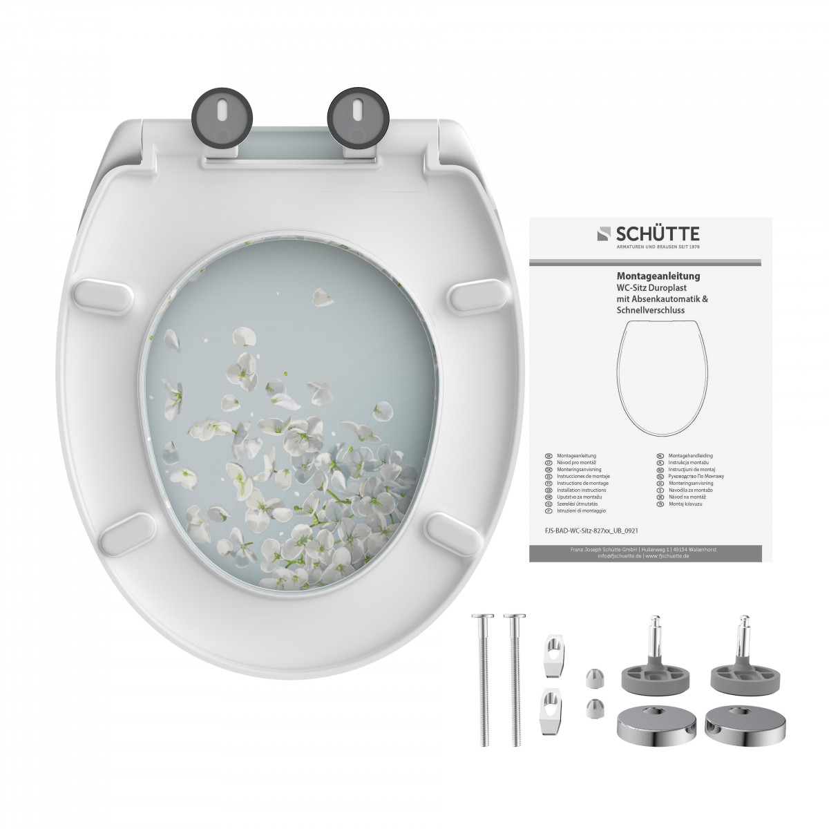 WC-Sitz mit Blumenmuster, Montageset und Anleitung von Schütte.
