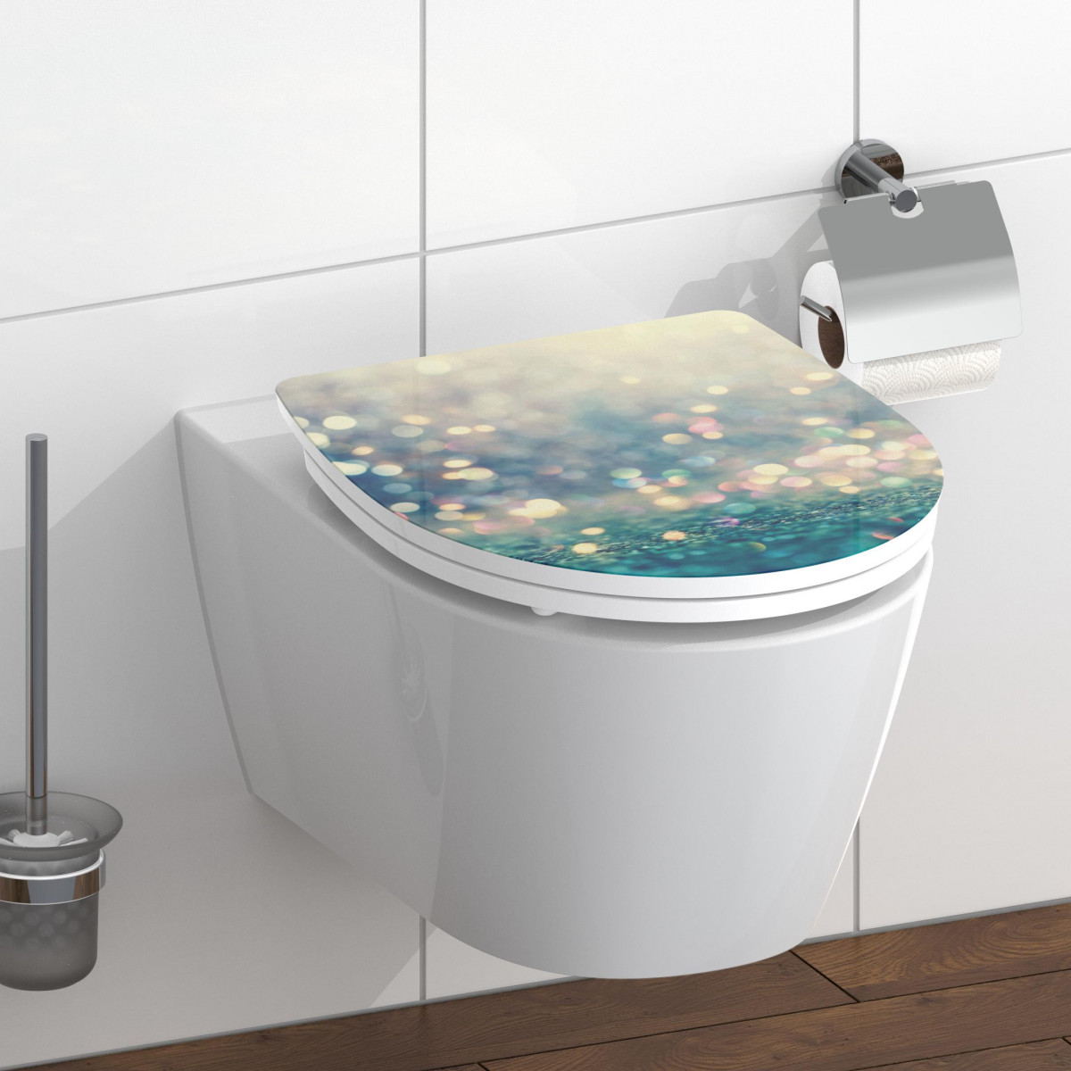 WC-Sitz mit blau-grünem Lichtpunkte-Motiv auf geschlossenem Deckel.