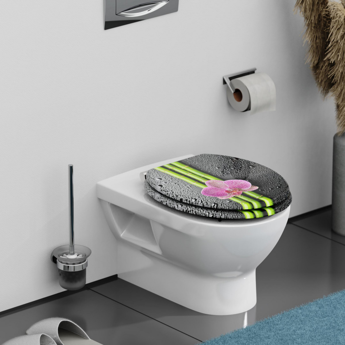 Geschlossener Toilettensitz mit Bambus-, Wasser- und Orchideenmotiv auf weißem WC.